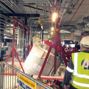 Mixer lowered into position. Note extra care and preparation is taken as this is a working production facility and an ATEX environment.