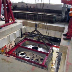 Mixer lowered into position. Note the mixer is sat between two floors. The top floor is for operator access and the bottom is for let down. It was a challenge to cut through the 12” concrete floor (including all necessary support) in preparation for the mixer.