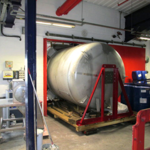 10,000 litre mixer on skates, travelled up an elevator and through the door to gain access to the production facility and its final location.