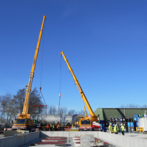 Storage vessels delivered on site via HGV ready to be picked up and placed on plinth