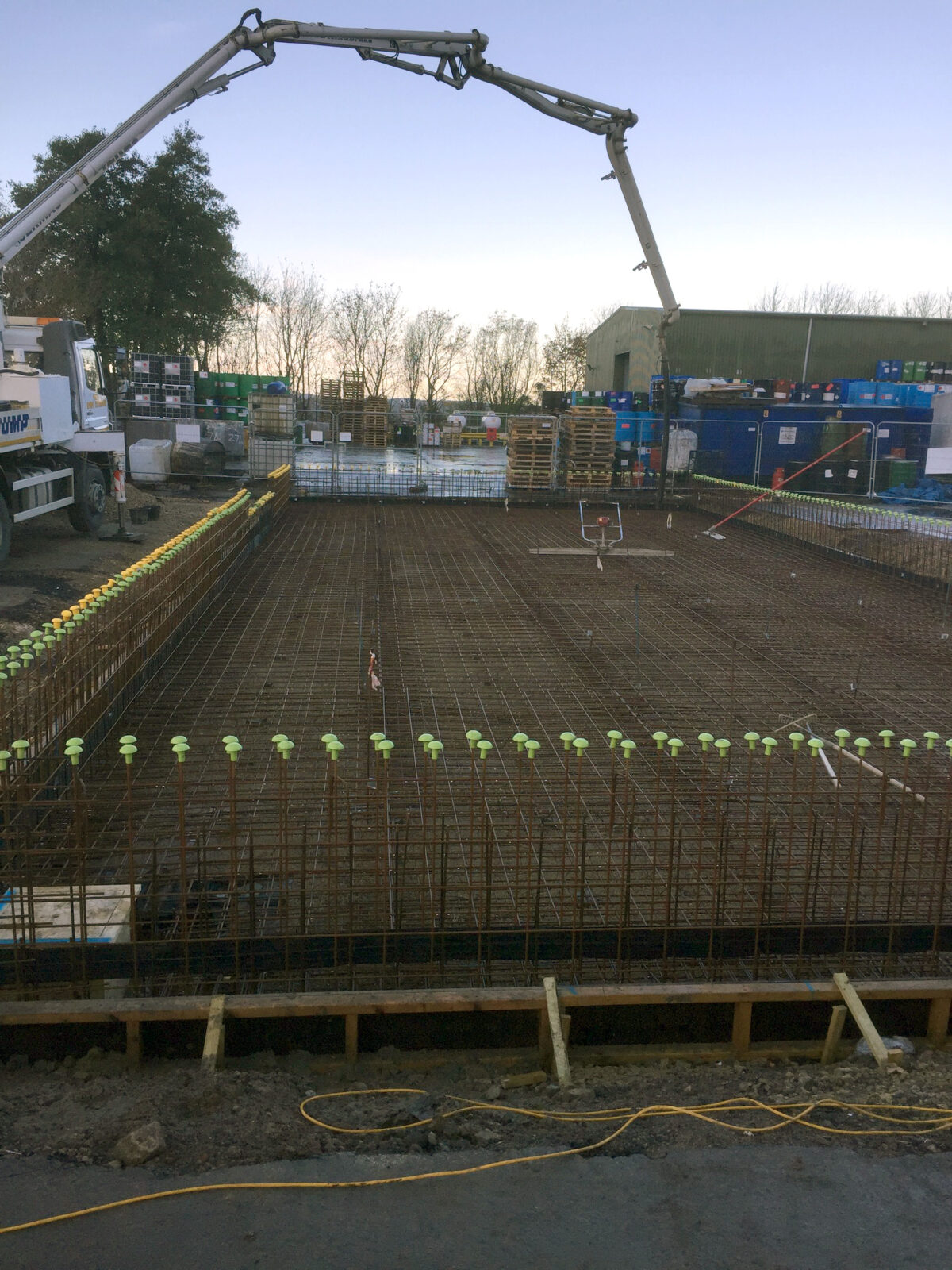 Bund construction underway – pumping concrete